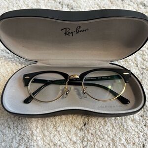 Ray-Ban Clubmaster Oval Classic Black and Gold sunglasses or prescription.